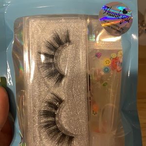 Eyelashes and lipgloss